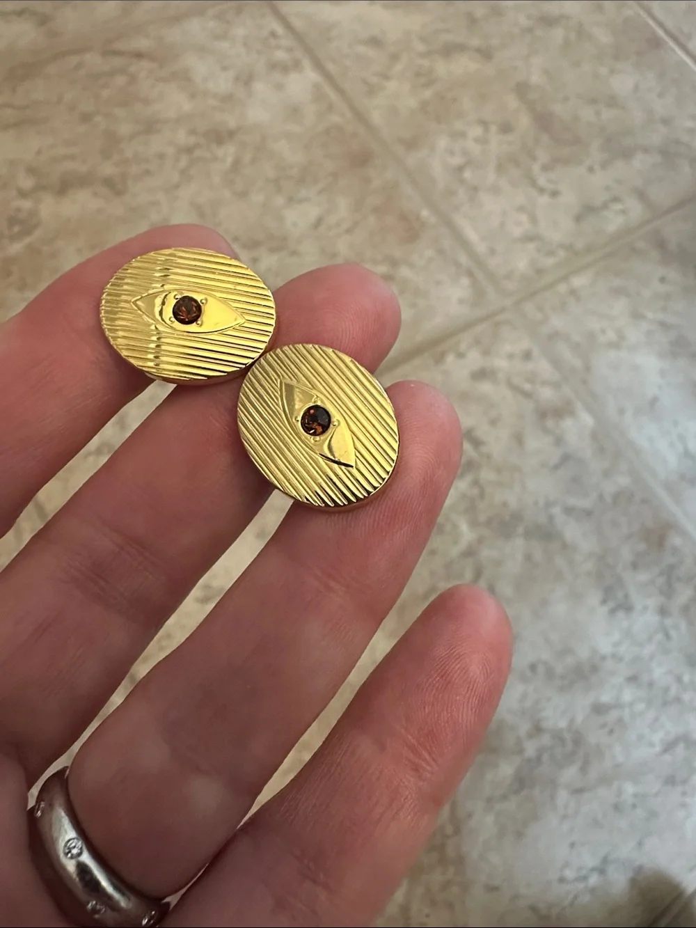 Gold Oval Cufflinks with Garnet Center